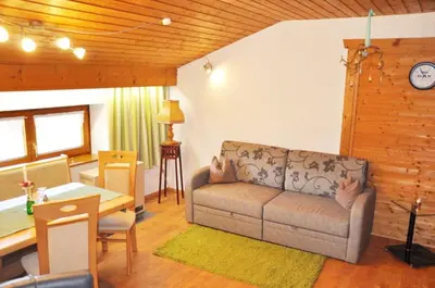 Ein Sitzbereich in der Unterkunft Haus Hubertus