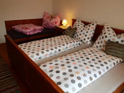 Ein Bett oder Betten in einem Zimmer der Unterkunft Haus Berauer