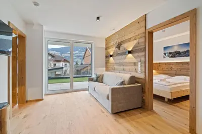Ein Bett oder Betten in einem Zimmer der Unterkunft FamilienWohnung Wildspitze