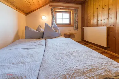 Ein Bett oder Betten in einem Zimmer der Unterkunft Almliesl MITT-396
