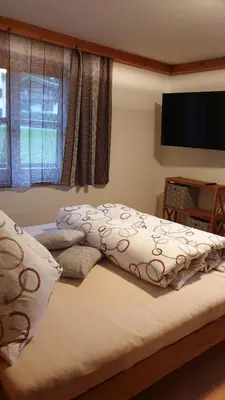 Ein Bett oder Betten in einem Zimmer der Unterkunft Landhaus Hoschek