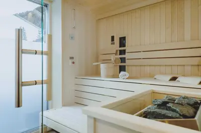 Ein Bett oder Betten in einem Zimmer der Unterkunft GLEMM by AvenidA Superior Hotel & Residences