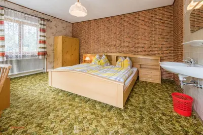 Ein Bett oder Betten in einem Zimmer der Unterkunft Almliesl HOLL-304