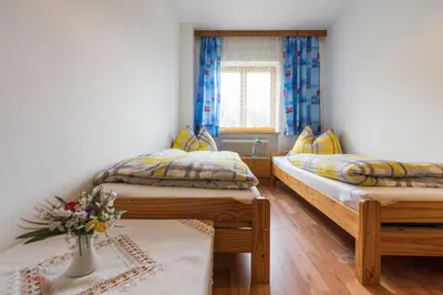 Ein Bett oder Betten in einem Zimmer der Unterkunft Almliesl HOLL-304