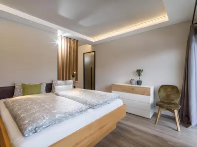 Ein Bett oder Betten in einem Zimmer der Unterkunft Tirol Appartements Schwaiger