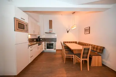 Küche/Küchenzeile in der Unterkunft Appartementhaus Kristall incl Joker Card by All in One Apartments