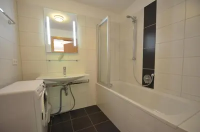 Ein Badezimmer in der Unterkunft Appartementhaus Kristall incl Joker Card by All in One Apartments