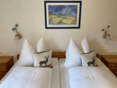 Ein Bett oder Betten in einem Zimmer der Unterkunft Landhaus Krall