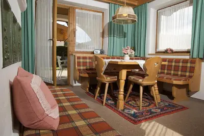 Ein Sitzbereich in der Unterkunft Haus Alexander