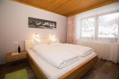 Ein Bett oder Betten in einem Zimmer der Unterkunft Haus Alexander
