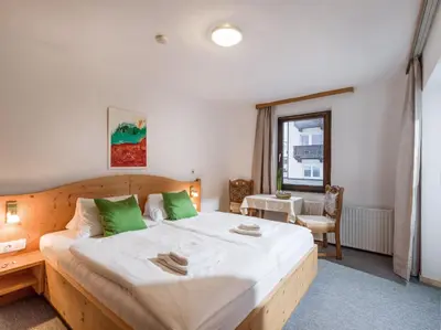 Ein Bett oder Betten in einem Zimmer der Unterkunft Pension Konrad