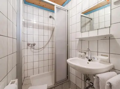 Ein Badezimmer in der Unterkunft Pension Konrad