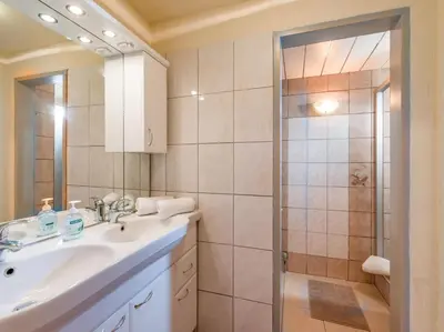Ein Badezimmer in der Unterkunft Pension Konrad