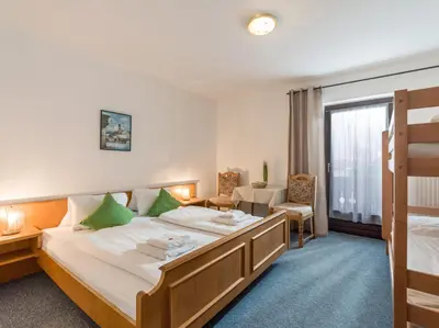 Ein Bett oder Betten in einem Zimmer der Unterkunft Pension Konrad