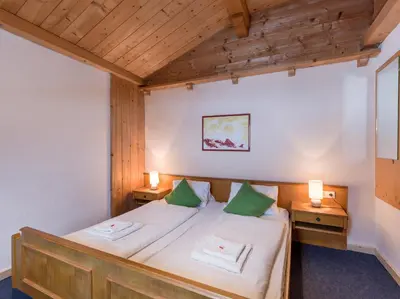 Ein Bett oder Betten in einem Zimmer der Unterkunft Pension Konrad
