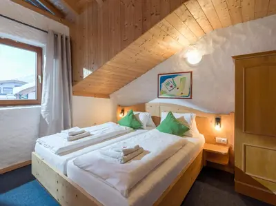 Ein Bett oder Betten in einem Zimmer der Unterkunft Pension Konrad