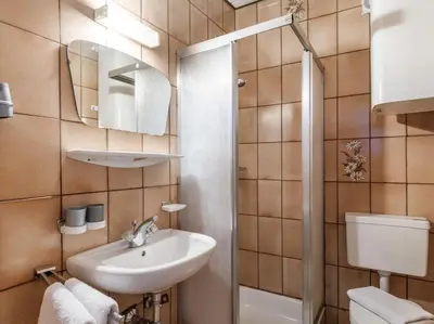 Ein Badezimmer in der Unterkunft Pension Konrad