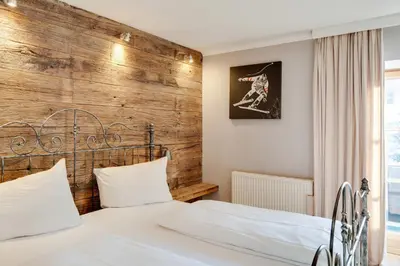 Ein Bett oder Betten in einem Zimmer der Unterkunft Design Apartment Villa Anna Kitzbühel