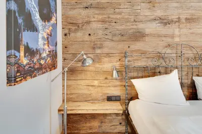 Ein Bett oder Betten in einem Zimmer der Unterkunft Design Apartment Villa Anna Kitzbühel
