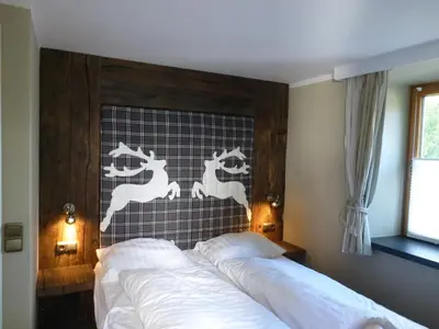 Ein Bett oder Betten in einem Zimmer der Unterkunft Design Apartment Villa Anna Kitzbühel