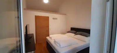 Ein Bett oder Betten in einem Zimmer der Unterkunft Appartement Spitzenstätter
