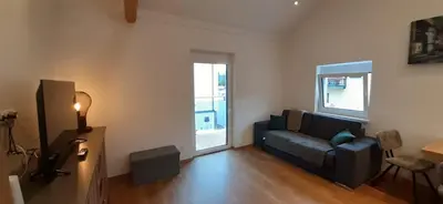 Ein Sitzbereich in der Unterkunft Appartement Spitzenstätter