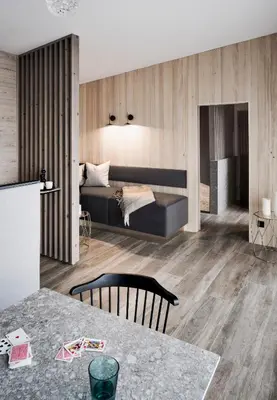 Ein Bett oder Betten in einem Zimmer der Unterkunft RIDERS Suite