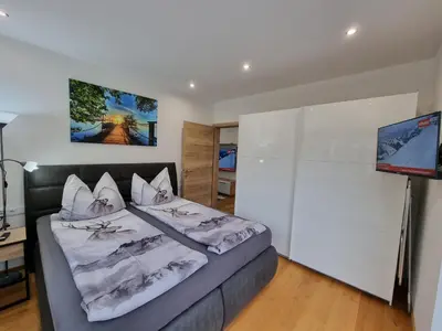Ein Bett oder Betten in einem Zimmer der Unterkunft Golf & Ski Appartements Mittersill Trausmuth Monika inkl Sommercard - Golfplatz 500 m entfernt, inkl Waschmaschine, Trockner