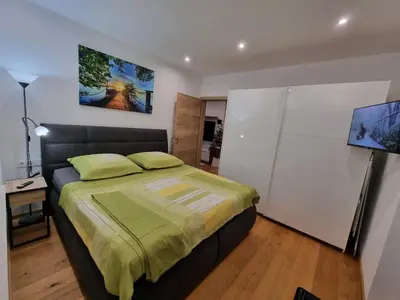 Ein Bett oder Betten in einem Zimmer der Unterkunft Golf & Ski Appartements Mittersill Trausmuth Monika inkl Sommercard - Golfplatz 500 m entfernt, inkl Waschmaschine, Trockner