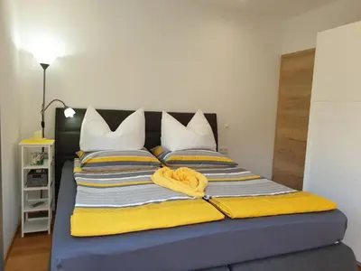 Ein Bett oder Betten in einem Zimmer der Unterkunft Golf & Ski Appartements Mittersill Trausmuth Monika inkl Sommercard - Golfplatz 500 m entfernt, inkl Waschmaschine, Trockner