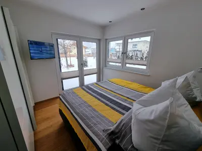 Ein Bett oder Betten in einem Zimmer der Unterkunft Golf & Ski Appartements Mittersill Trausmuth Monika inkl Sommercard - Golfplatz 500 m entfernt, inkl Waschmaschine, Trockner