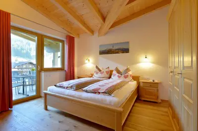 Ein Bett oder Betten in einem Zimmer der Unterkunft Appartement Erlenau