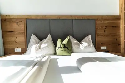 Ein Bett oder Betten in einem Zimmer der Unterkunft Haus Auermühle