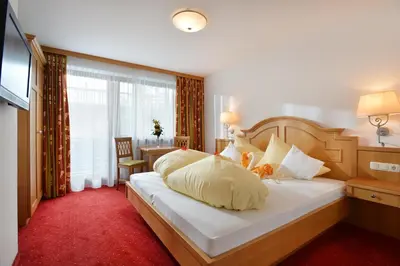 Ein Bett oder Betten in einem Zimmer der Unterkunft Café-Pension Kaisermann