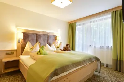 Ein Bett oder Betten in einem Zimmer der Unterkunft Café-Pension Kaisermann