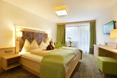 Ein Bett oder Betten in einem Zimmer der Unterkunft Café-Pension Kaisermann