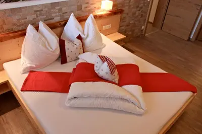 Ein Bett oder Betten in einem Zimmer der Unterkunft Alpenchalet Zillertal