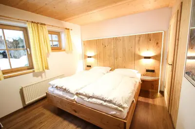 Ein Bett oder Betten in einem Zimmer der Unterkunft Chalet Königsleiten 174