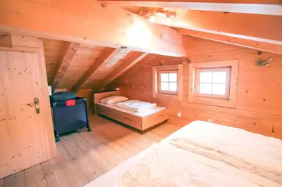 Ein Bett oder Betten in einem Zimmer der Unterkunft Chalet Königsleiten 174