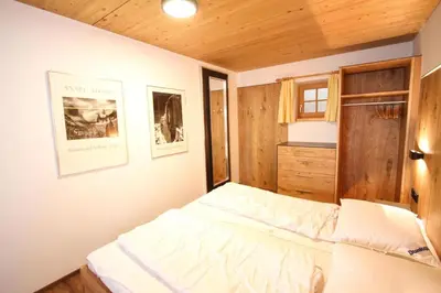 Ein Bett oder Betten in einem Zimmer der Unterkunft Chalet Königsleiten 174