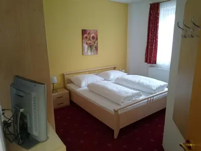 Ein Bett oder Betten in einem Zimmer der Unterkunft Gredler