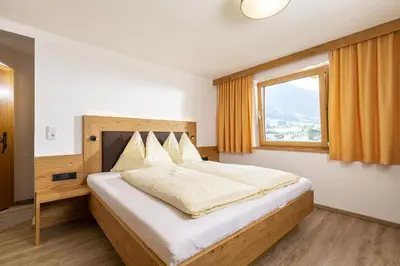 Ein Bett oder Betten in einem Zimmer der Unterkunft Edelweiss