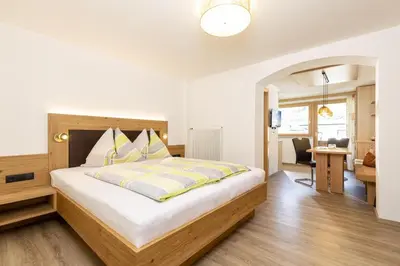 Ein Bett oder Betten in einem Zimmer der Unterkunft Edelweiss