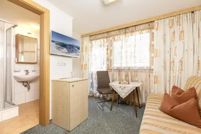 Ein Sitzbereich in der Unterkunft Edelweiss