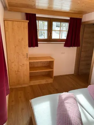 Ein Bett oder Betten in einem Zimmer der Unterkunft Der Waidachhof Zillertal