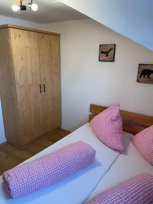 Ein Bett oder Betten in einem Zimmer der Unterkunft Der Waidachhof Zillertal