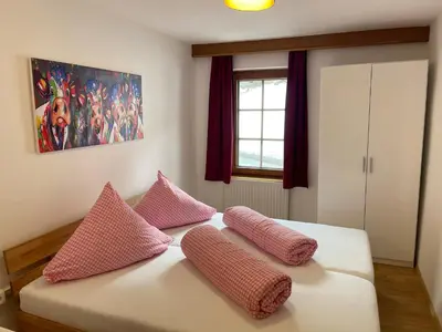 Ein Bett oder Betten in einem Zimmer der Unterkunft Der Waidachhof Zillertal