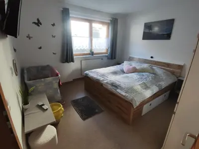 Ein Bett oder Betten in einem Zimmer der Unterkunft Haus Yvonne