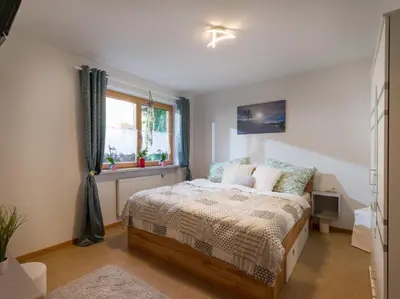 Ein Bett oder Betten in einem Zimmer der Unterkunft Haus Yvonne