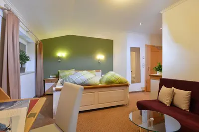 Ein Bett oder Betten in einem Zimmer der Unterkunft Café-Restaurant Bettina